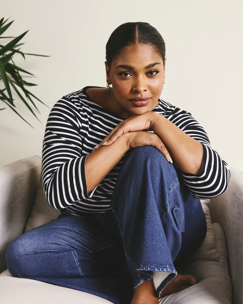 Woman wearing Belle Breton Stripe Jersey Tee - Black/White Stripe from Universal Standard