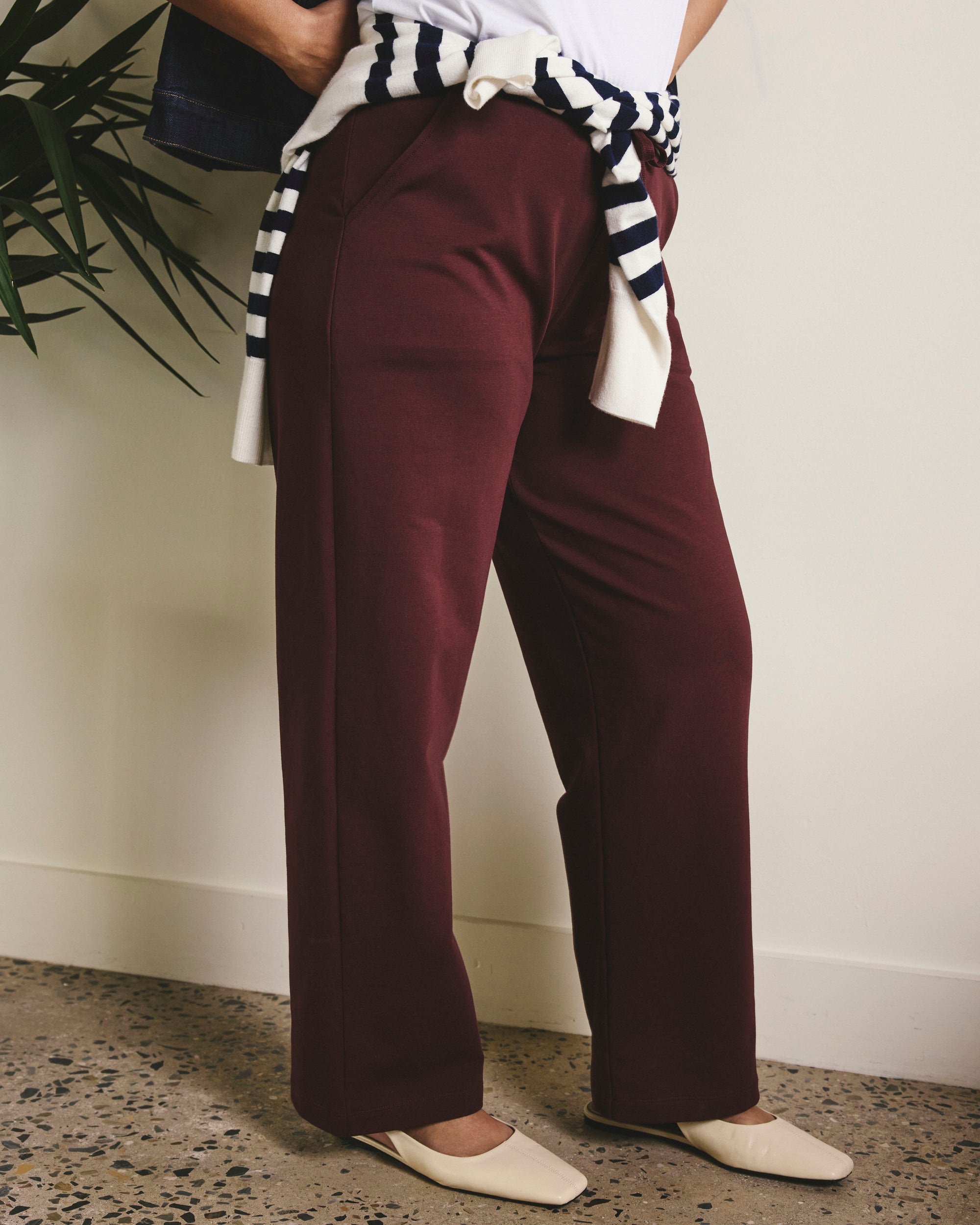 Woman wearing Straight Leg French Terry Sweatpants - Black Cherry from Universal Standard