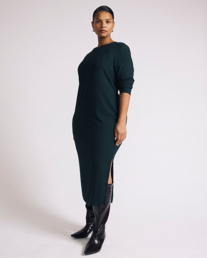 Woman wearing Xenia Ribbed Dress - Forest Green from Universal Standard