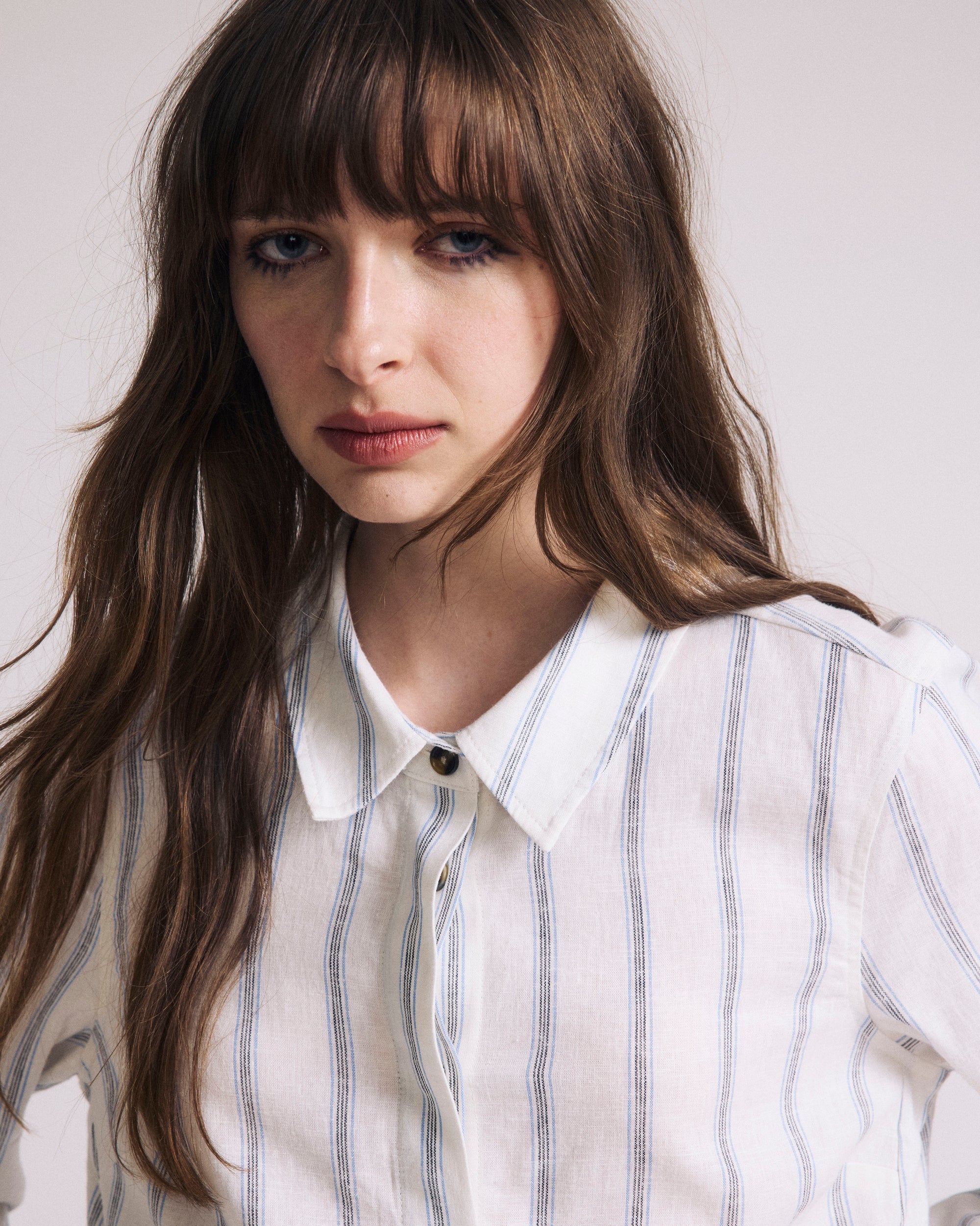 Woman wearing Elbe Stretch Linen Shirt - Mayfair Stripe from Universal Standard