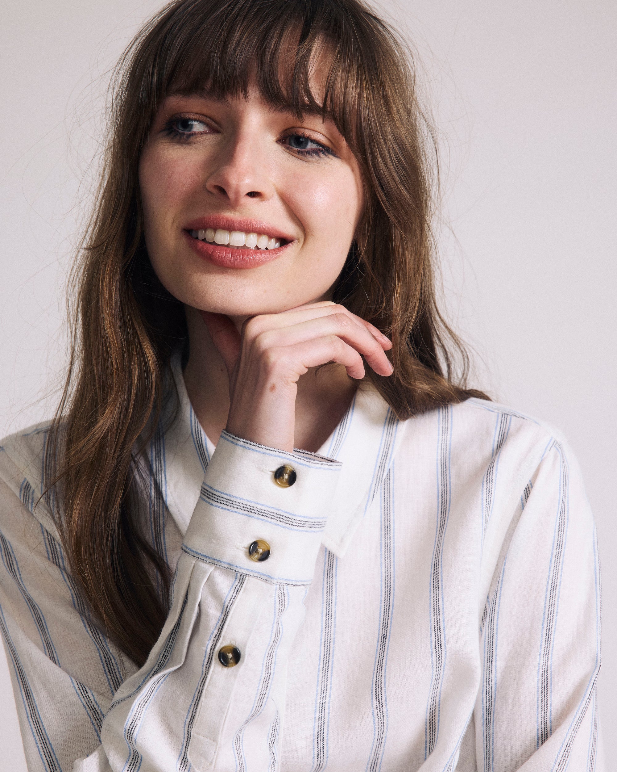 Woman wearing Elbe Stretch Linen Shirt - Mayfair Stripe from Universal Standard