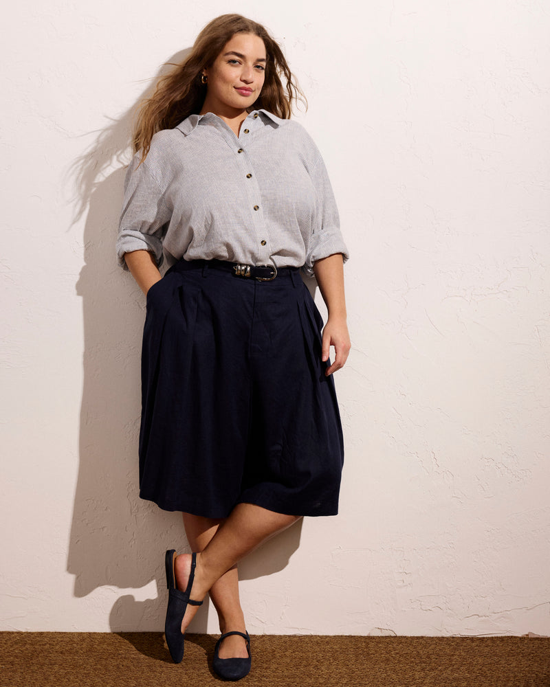 Woman wearing Seaport Tailored Linen Short - Navy from Universal Standard
