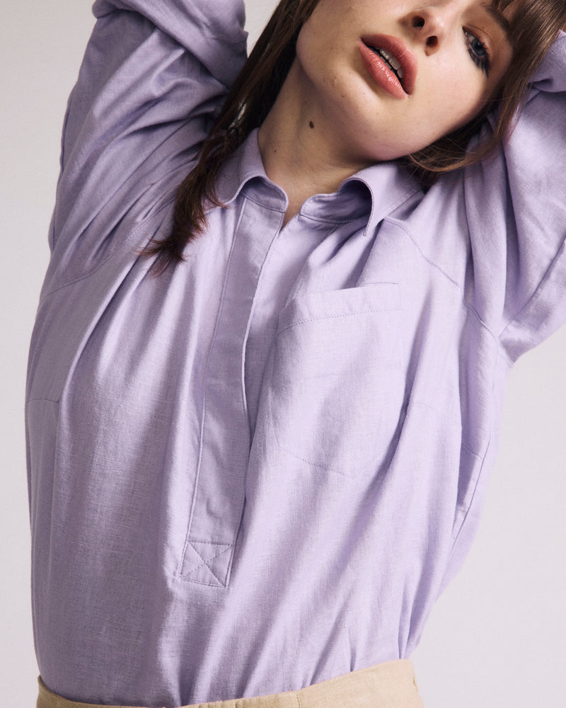 Woman wearing Elbe Popover Stretch Linen Shirt - Orchid from Universal Standard
