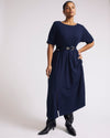 Woman wearing Serena Boatneck Divine Jersey Dress - Midnight from Universal Standard