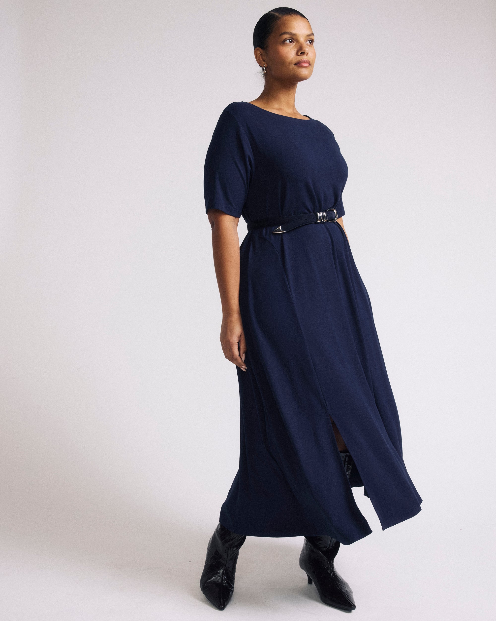 Woman wearing Serena Boatneck Divine Jersey Dress - Midnight from Universal Standard