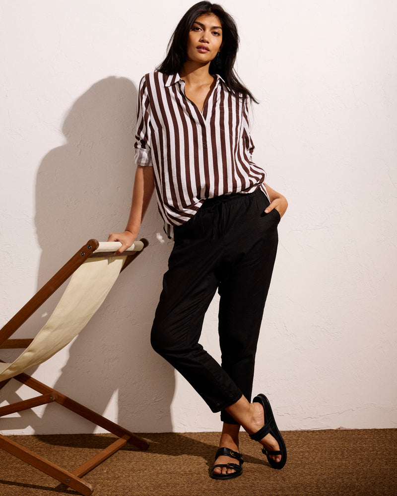 Woman wearing Sayville Linen Drawstring Pant - Black from Universal Standard