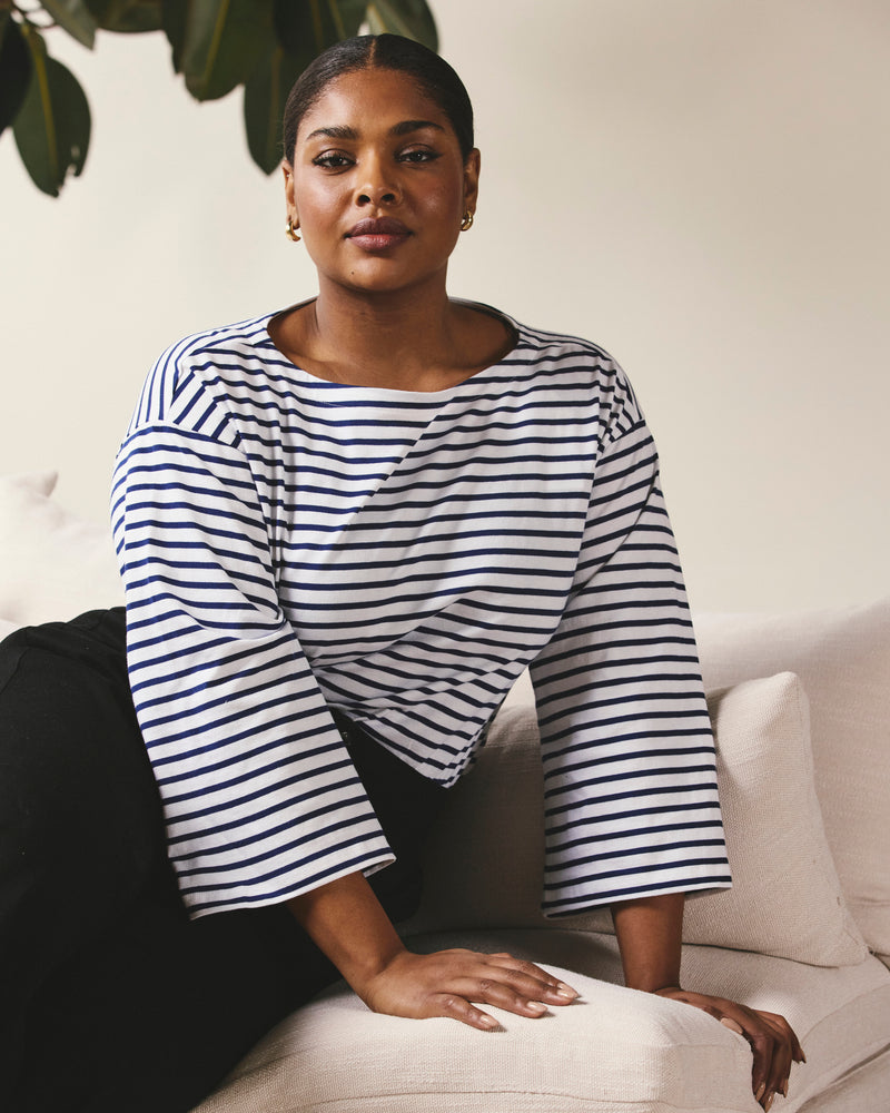 Woman wearing Montauk Breton Stripe Bell Sleeve Top - White/Cenote Stripe from Universal Standard