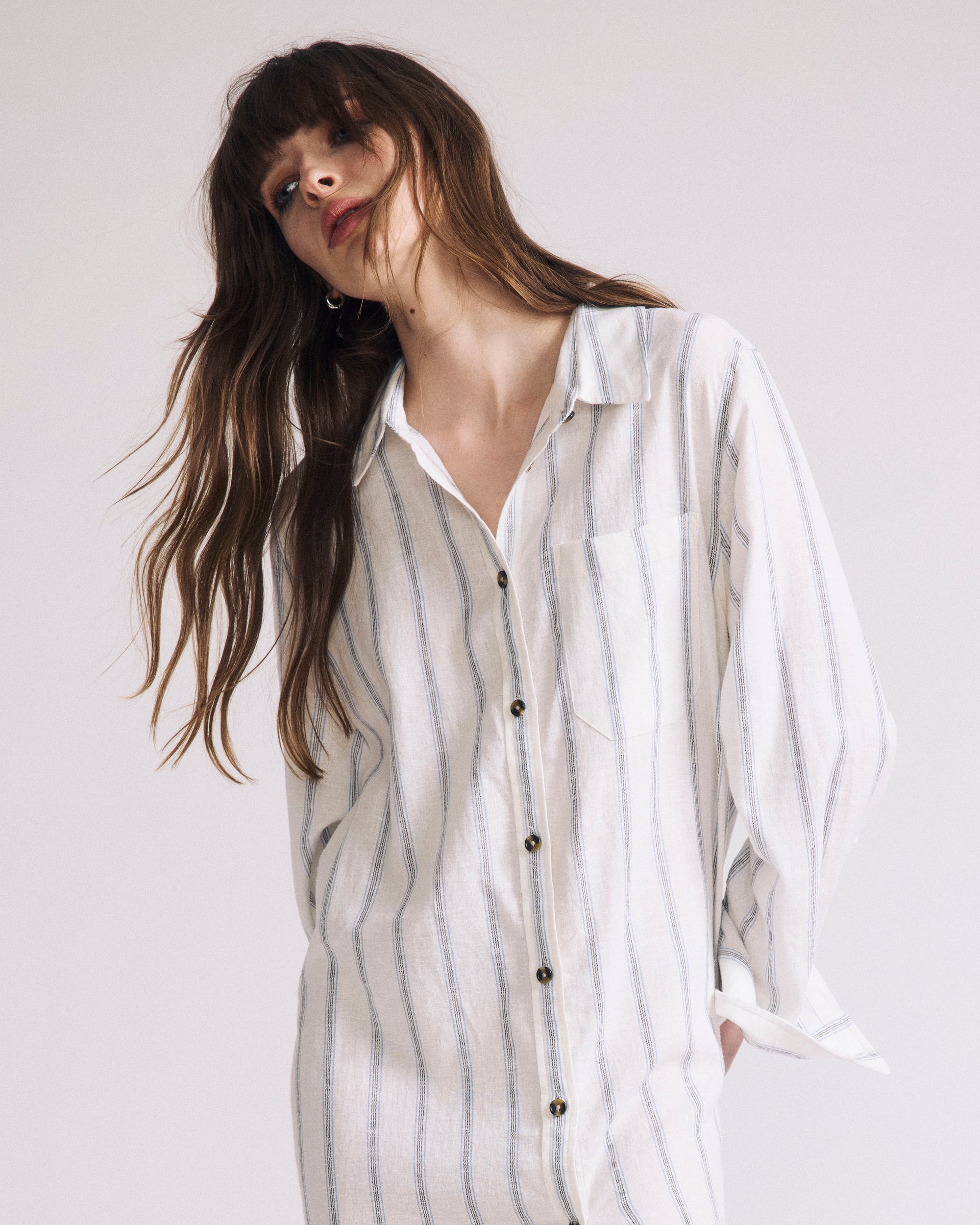 Woman wearing Odeon Linen Shirtdress - Mayfair Stripe from Universal Standard