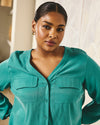 Woman wearing Cooling Stretch Cupro Button-Down Blouse - Green Tourmaline from PROMOTION