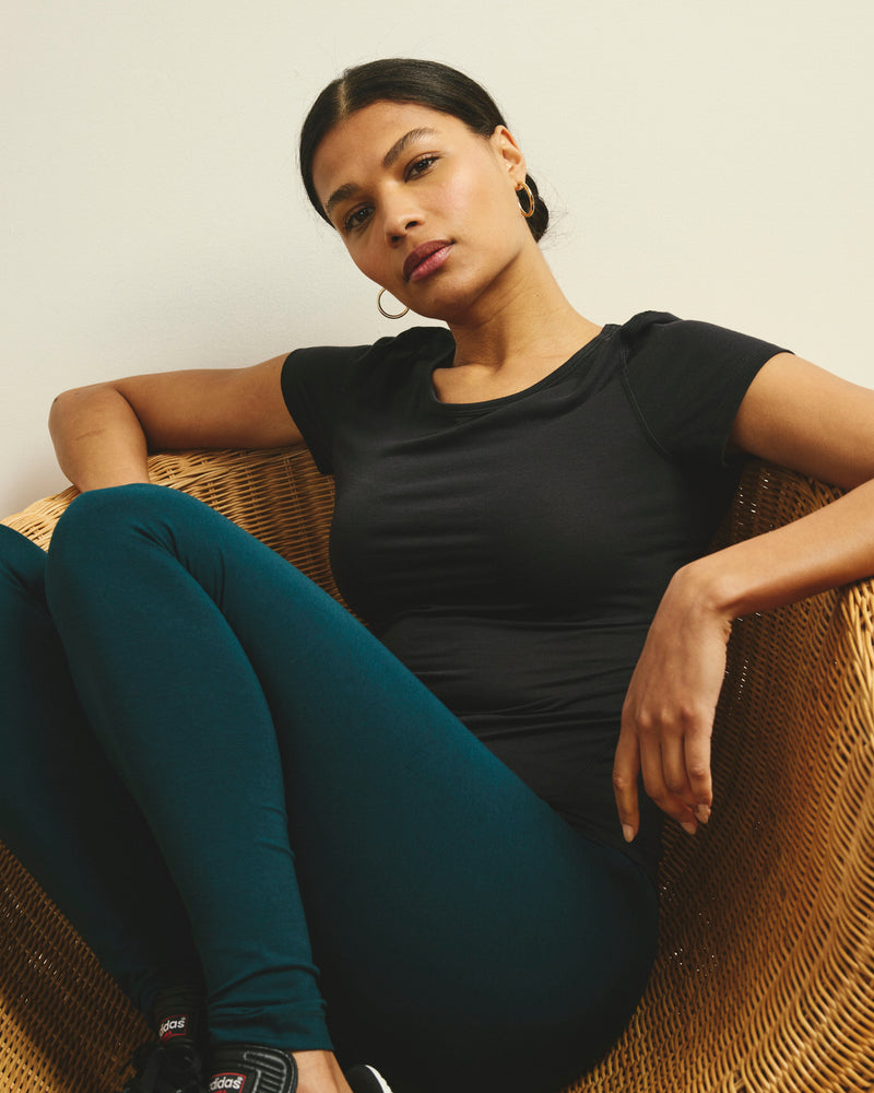 Woman wearing Mia Movement Tee - Black from Universal Standard