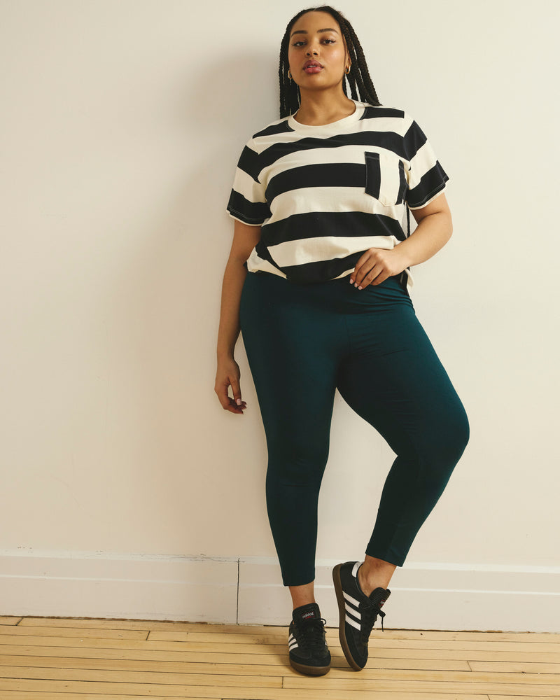 Woman wearing Roya Cropped Leggings 23 Inch - Deep Sea from Universal Standard