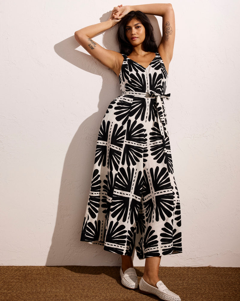 Woman wearing Promenade Linen Jumpsuit - Ink Bloom Print from Universal Standard