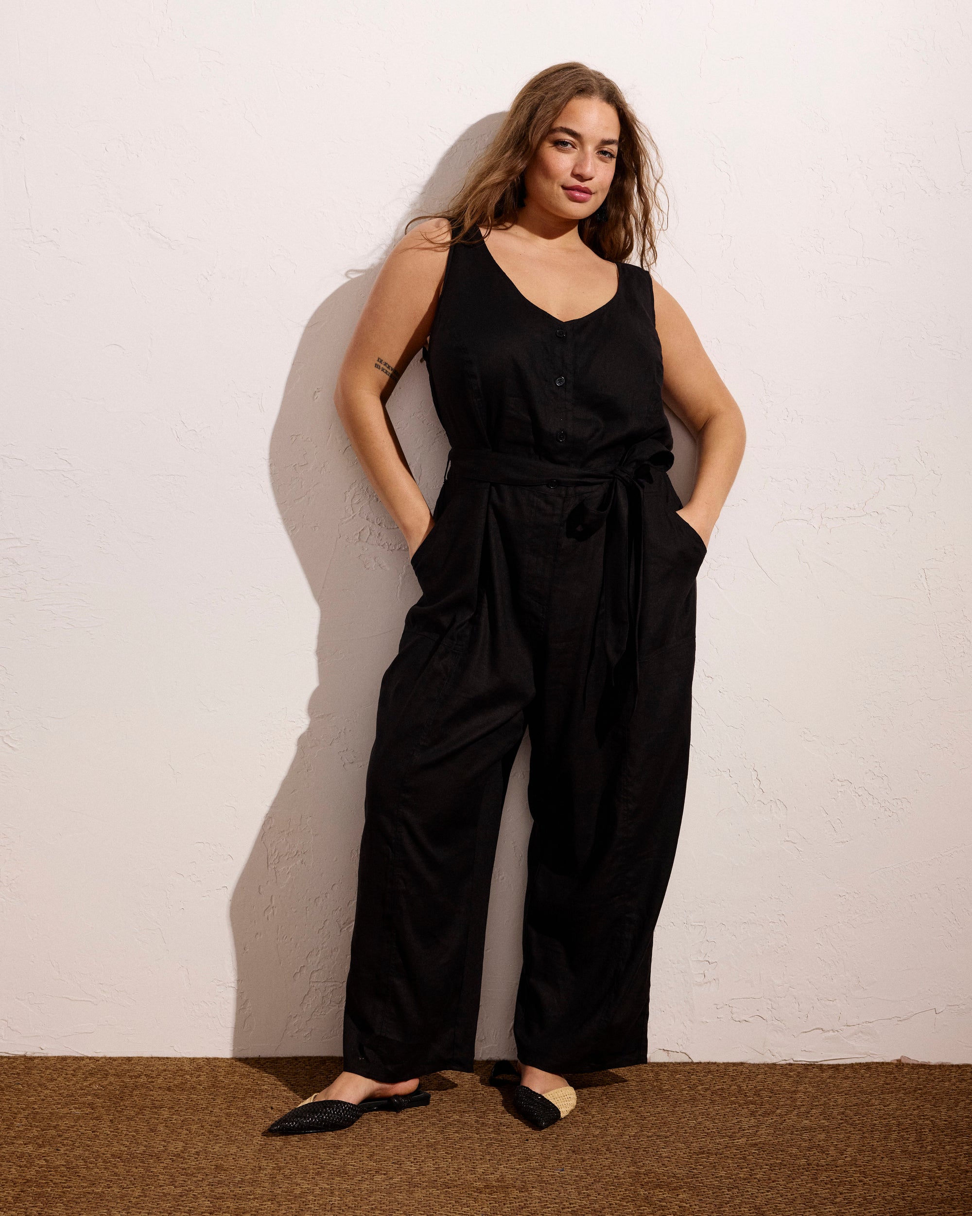 Woman wearing Matilda Linen Jumpsuit - Black from Universal Standard