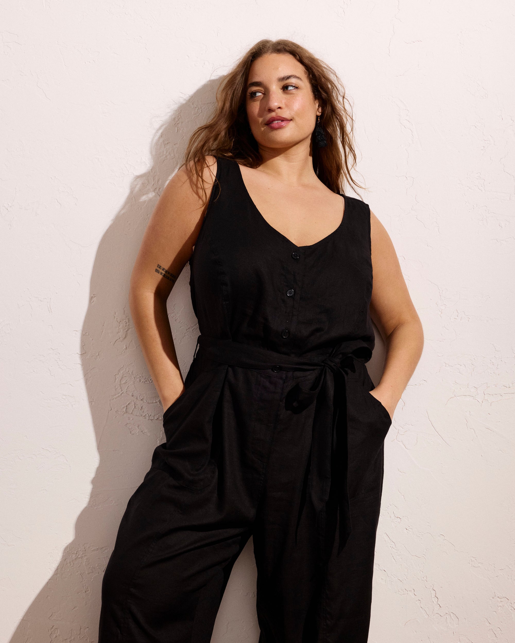 Woman wearing Matilda Linen Jumpsuit - Black from Universal Standard
