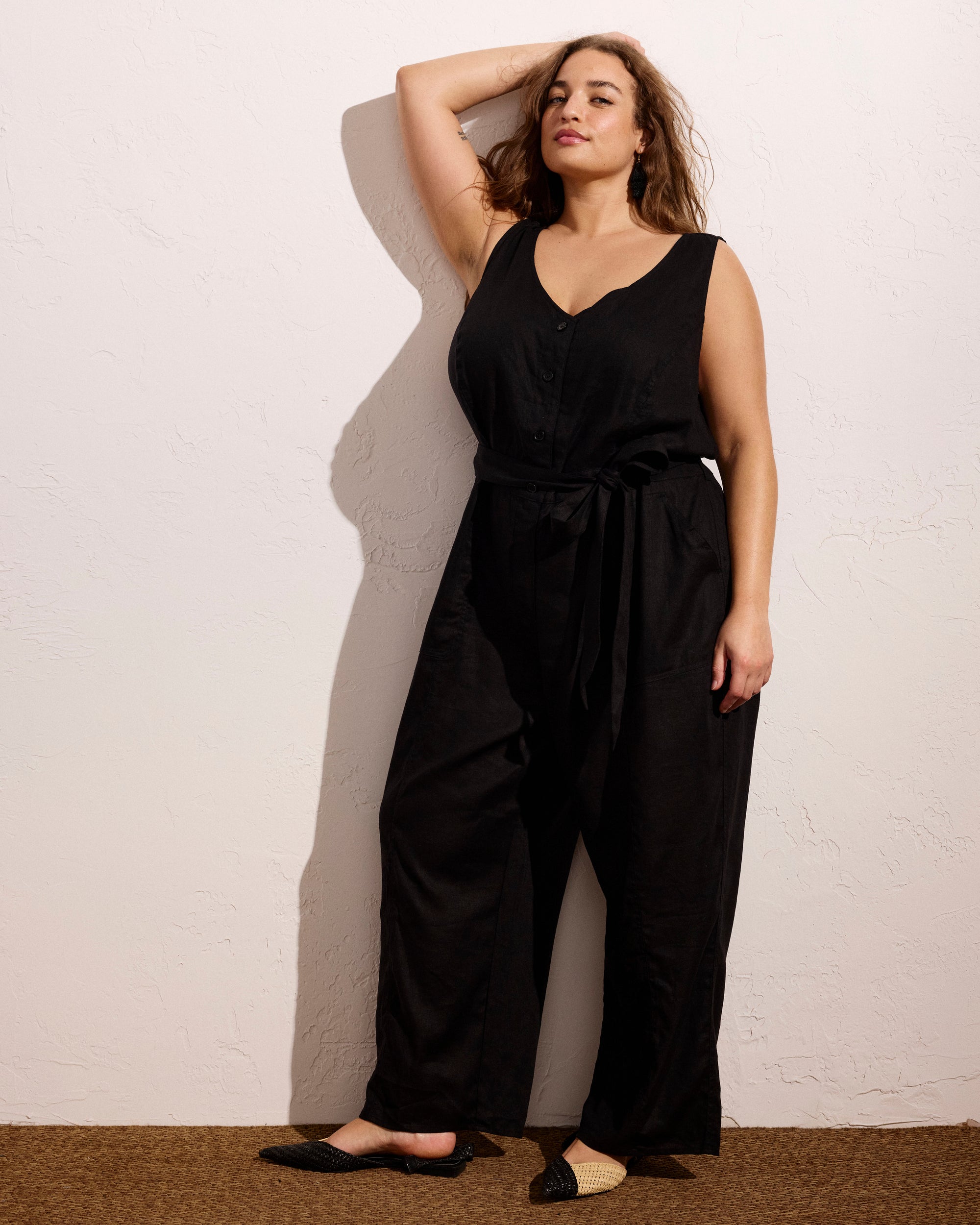 Woman wearing Matilda Linen Jumpsuit - Black from Universal Standard