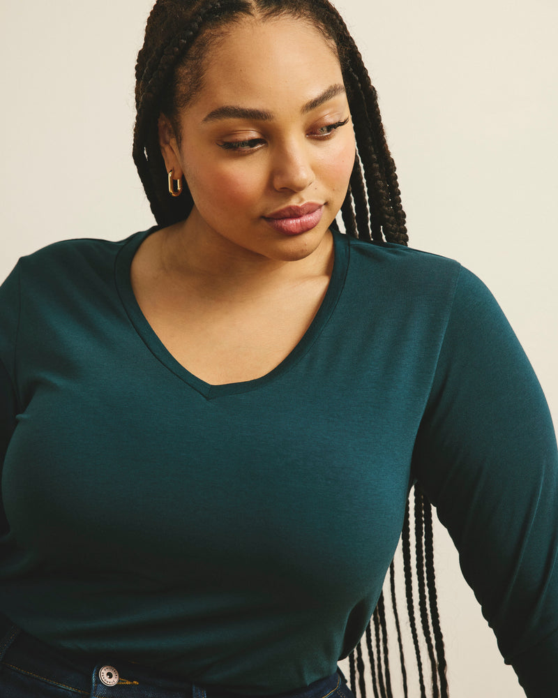 Woman wearing Long Sleeve V Rex - Deep Sea from Universal Standard