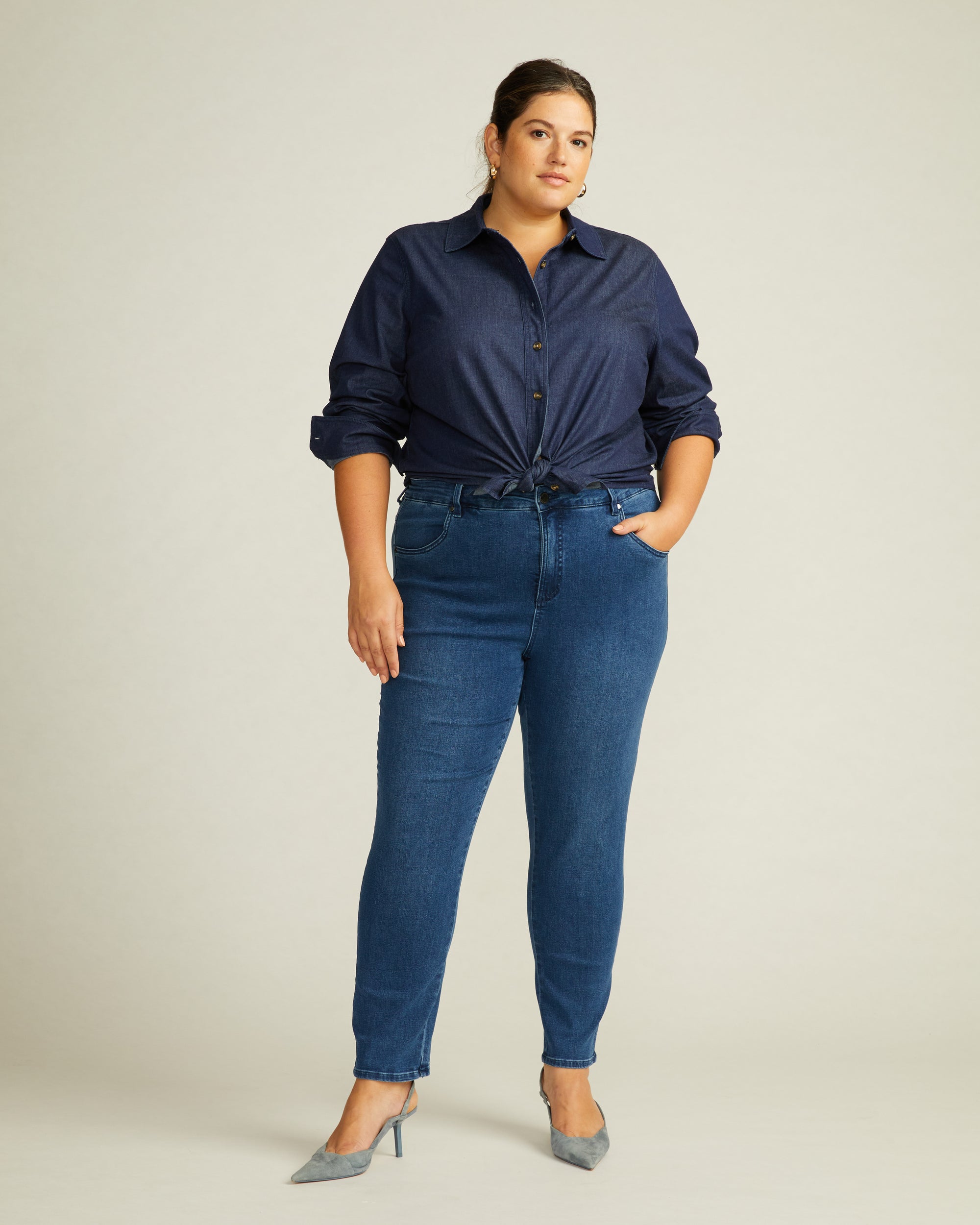 Woman wearing Minimalist Stretch Cotton Chambray Shirt - Dark Indigo from Universal Standard