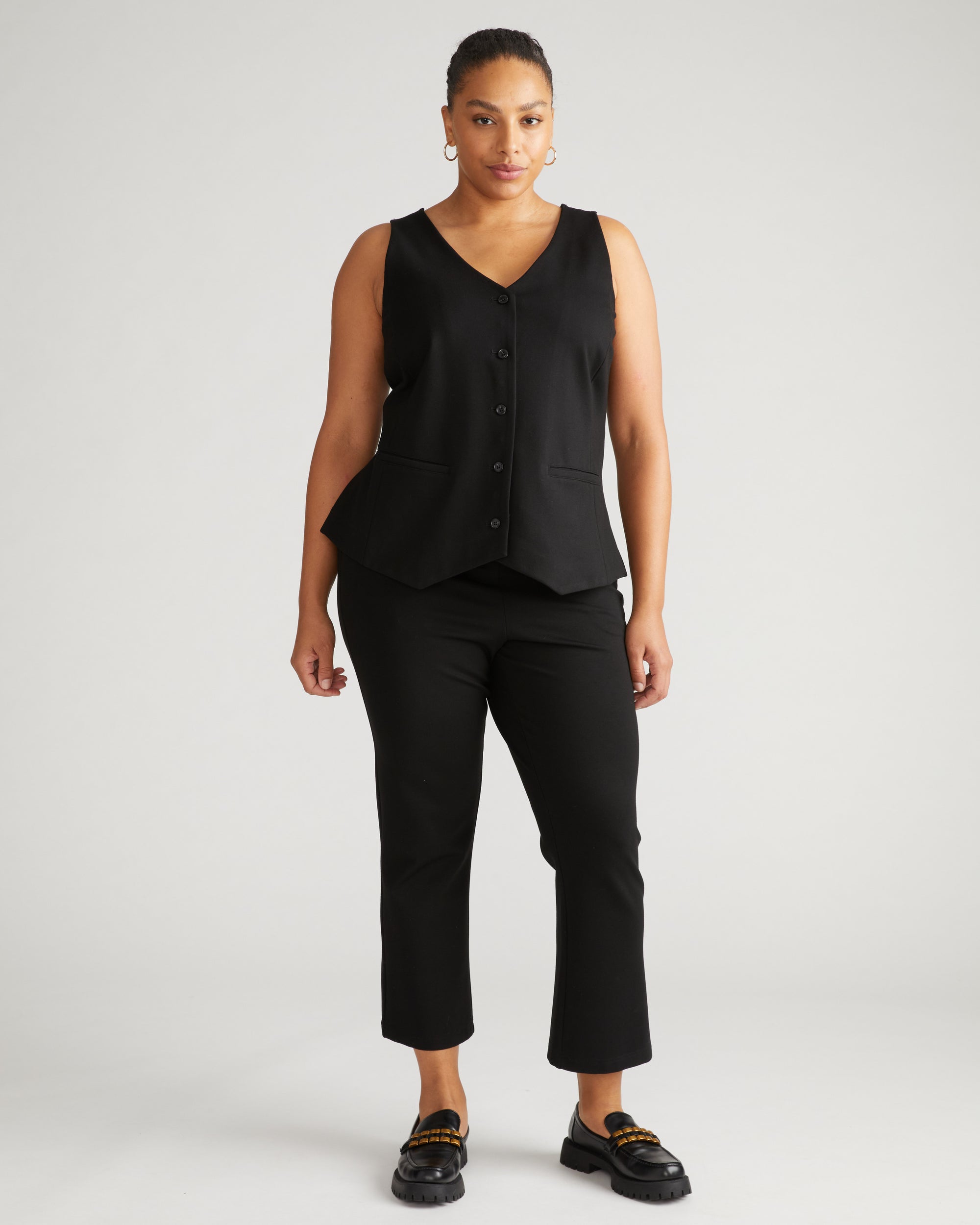 Woman wearing The Tailored Ponte Vest - Black from Universal Standard