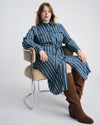 Woman wearing Cooling Stretch Cupro Savannah Dress - Ensign Blue/White Stripe from Universal Standard