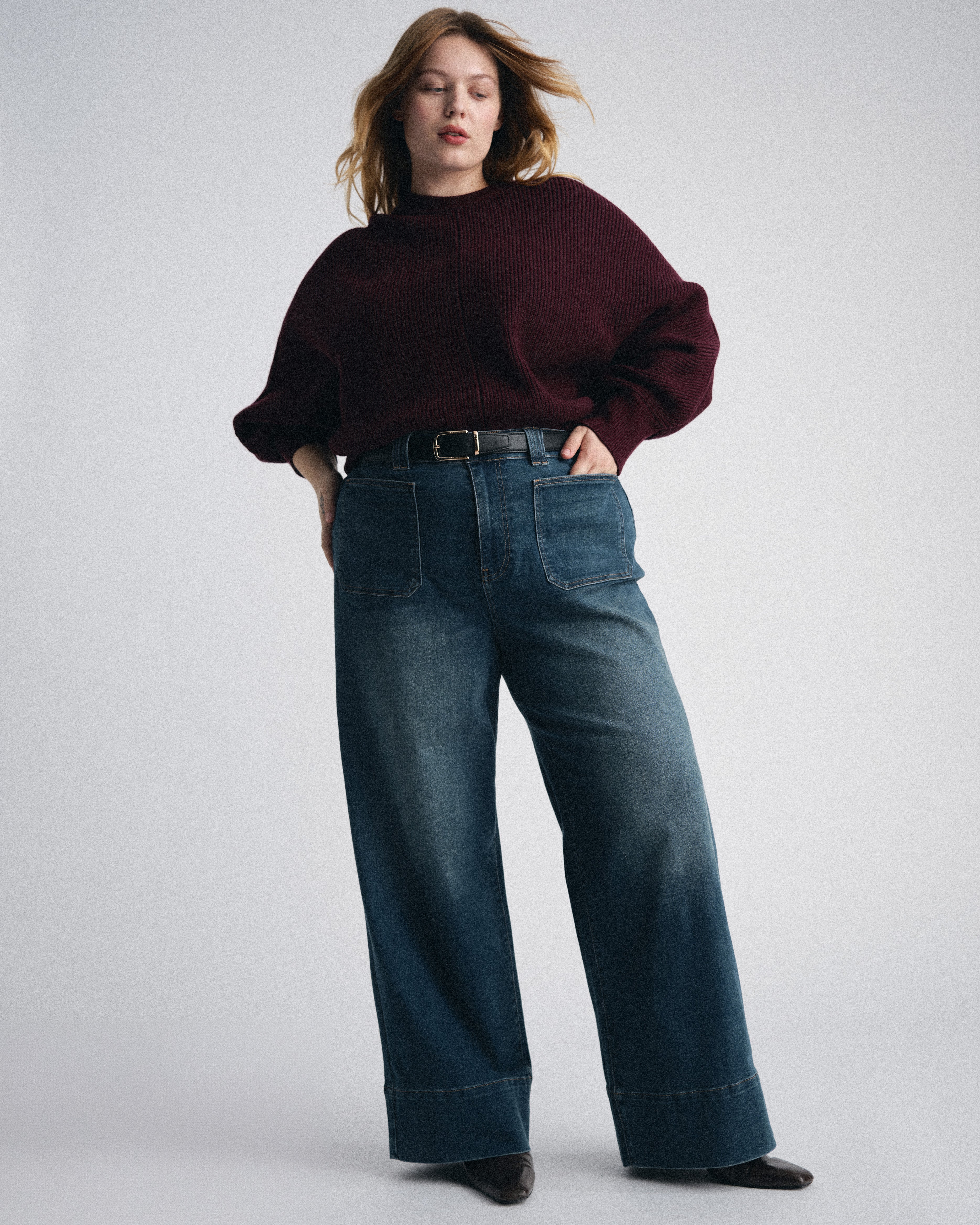 Woman wearing Claudia High Rise Stretch Jeans - Naval Blue Wash from Universal Standard