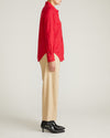 Woman wearing Elbe Popover Stretch Linen Shirt - Brilliant Red from Universal Standard