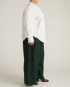 Woman wearing Elbe Popover Stretch Linen Shirt - Mayfair Stripe from Universal Standard