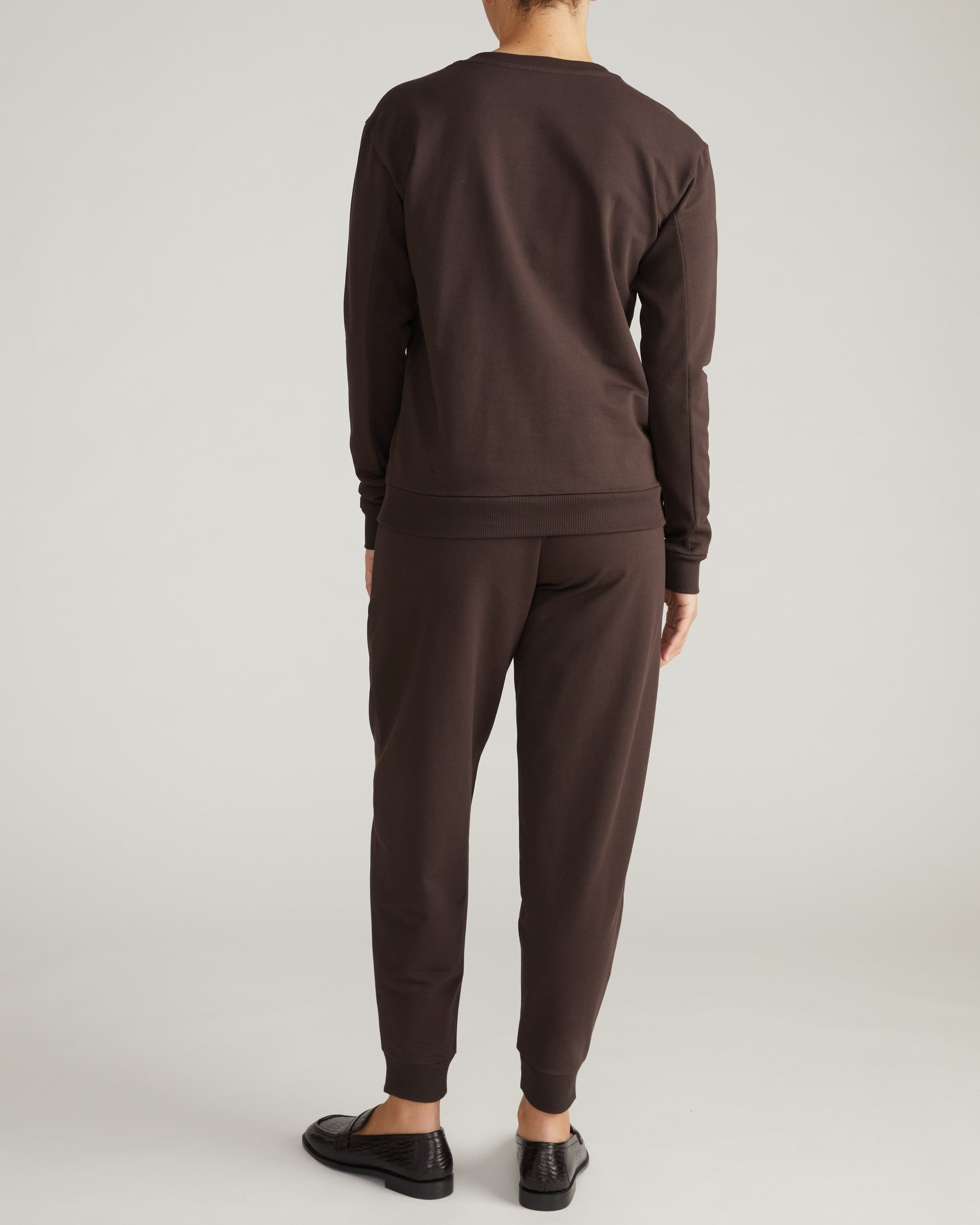 Woman wearing Meridien Zip Sweatshirt - Deep Brown from Universal Standard