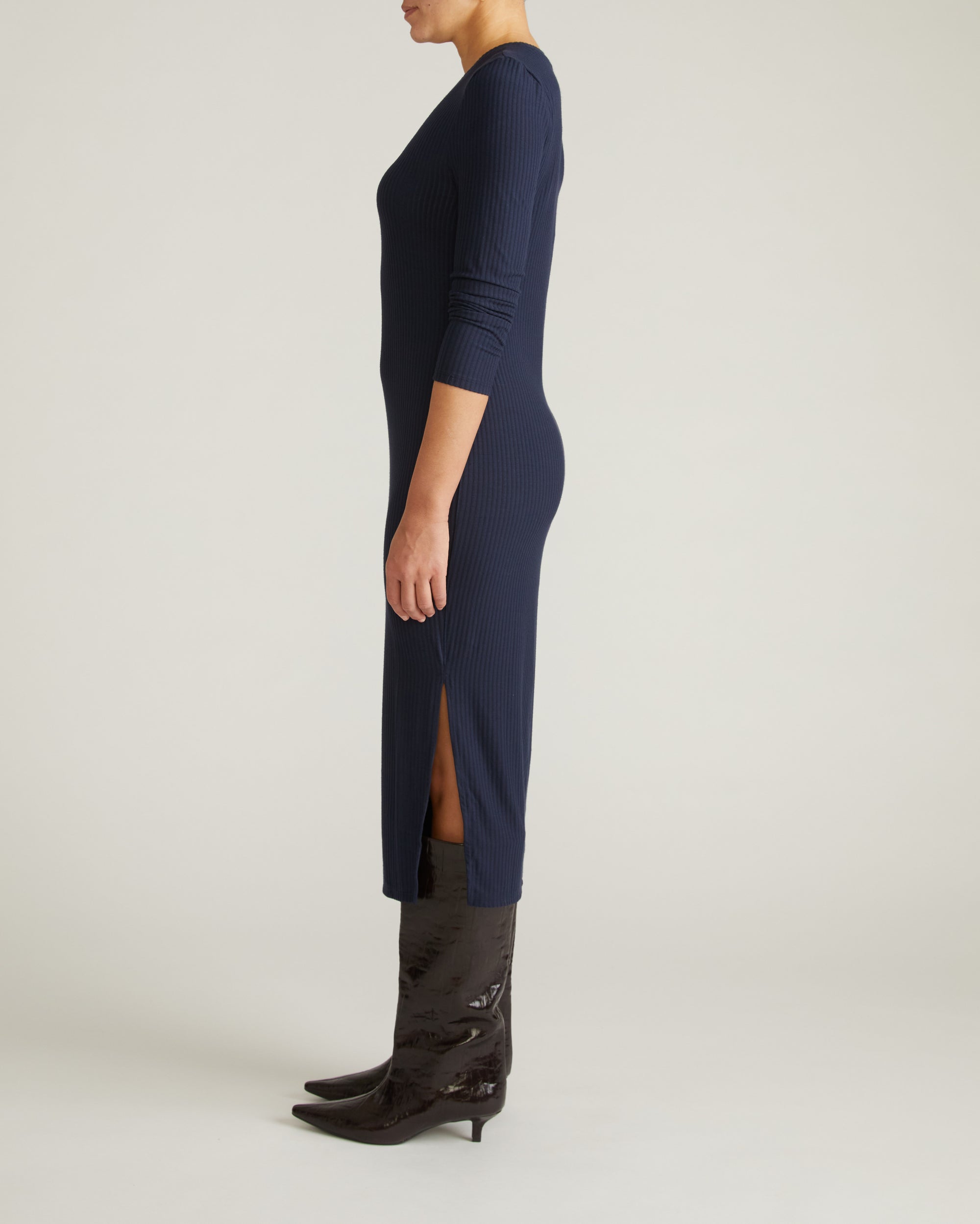 Woman wearing Xenia Ribbed Dress - Midnight from Universal Standard