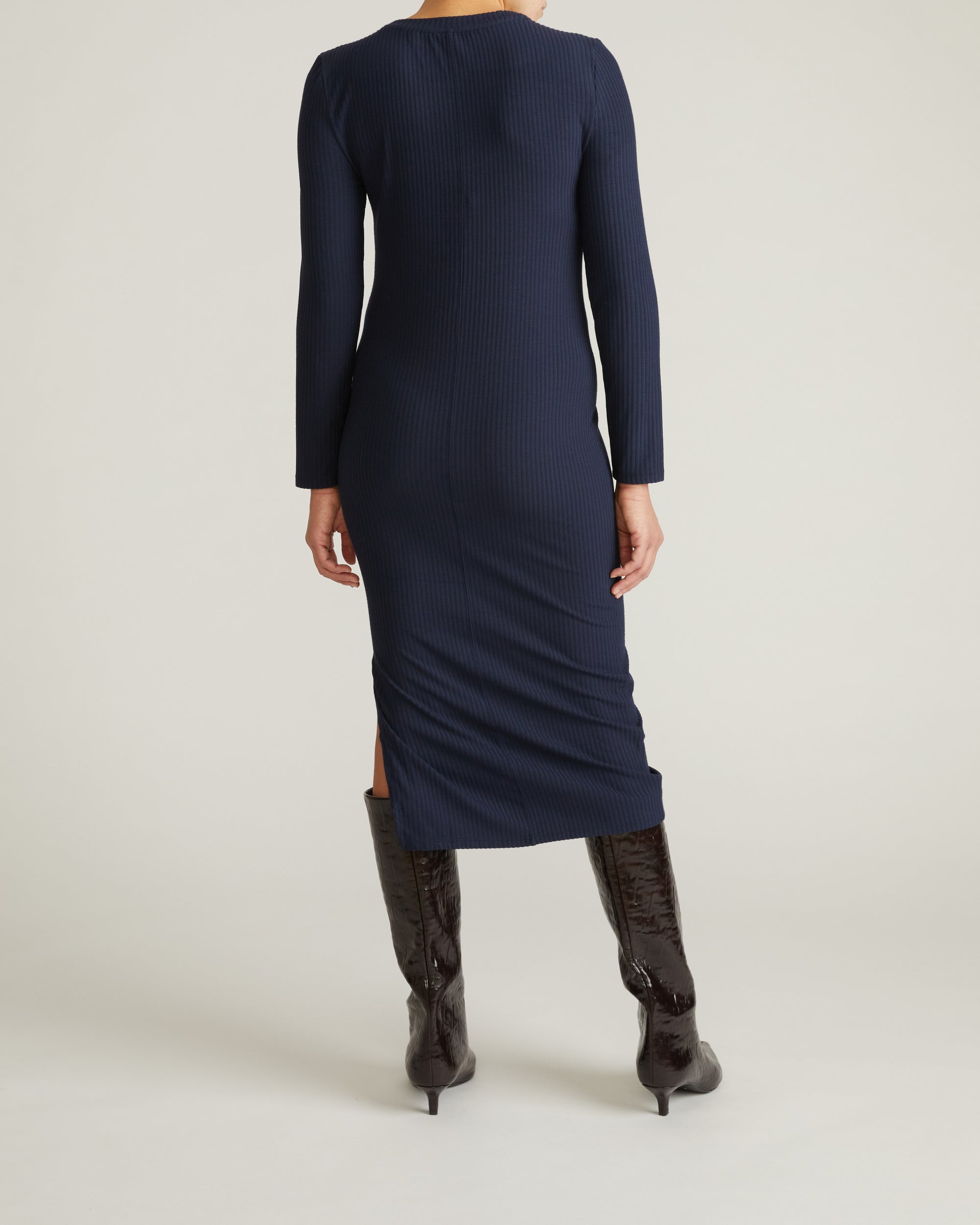 Woman wearing Xenia Ribbed Dress - Midnight from Universal Standard