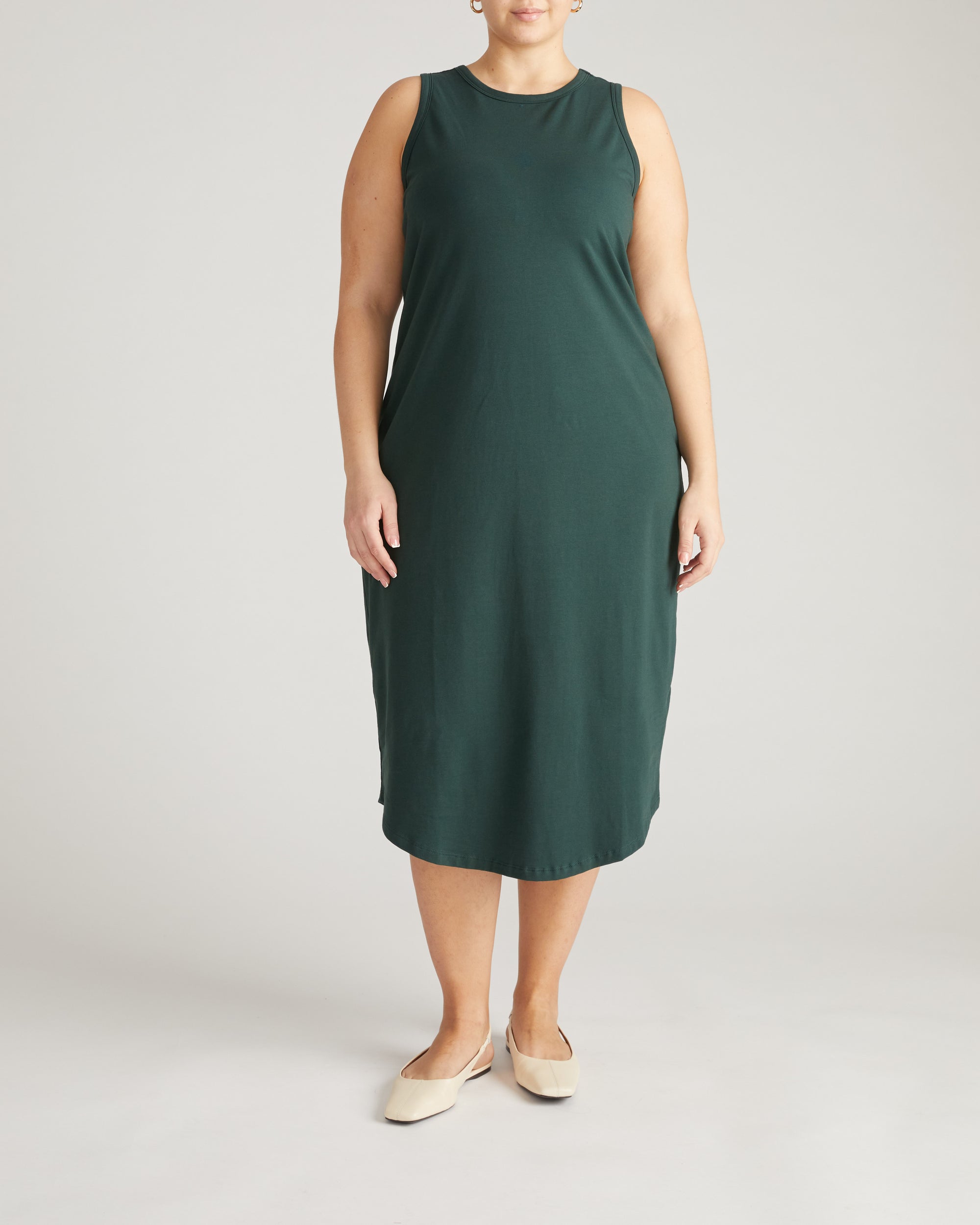 Woman wearing Cai High Neck Tank Dress - Forest Green from Universal Standard