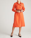 Woman wearing Cooling Stretch Cupro Savannah Dress - Orange Flame from Universal Standard