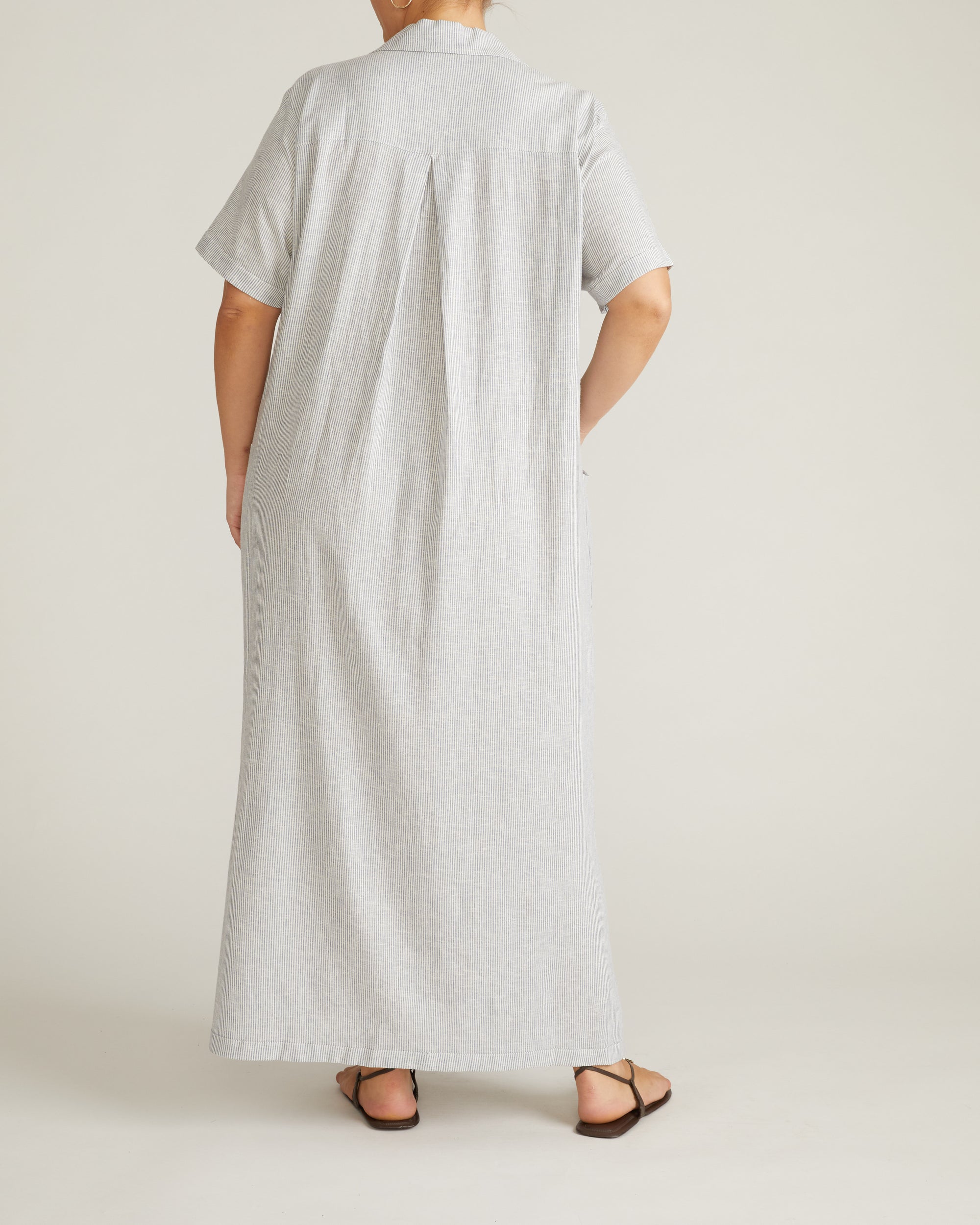 Woman wearing Padma Polo Neck Linen Dress - Beach Stripe from Universal Standard