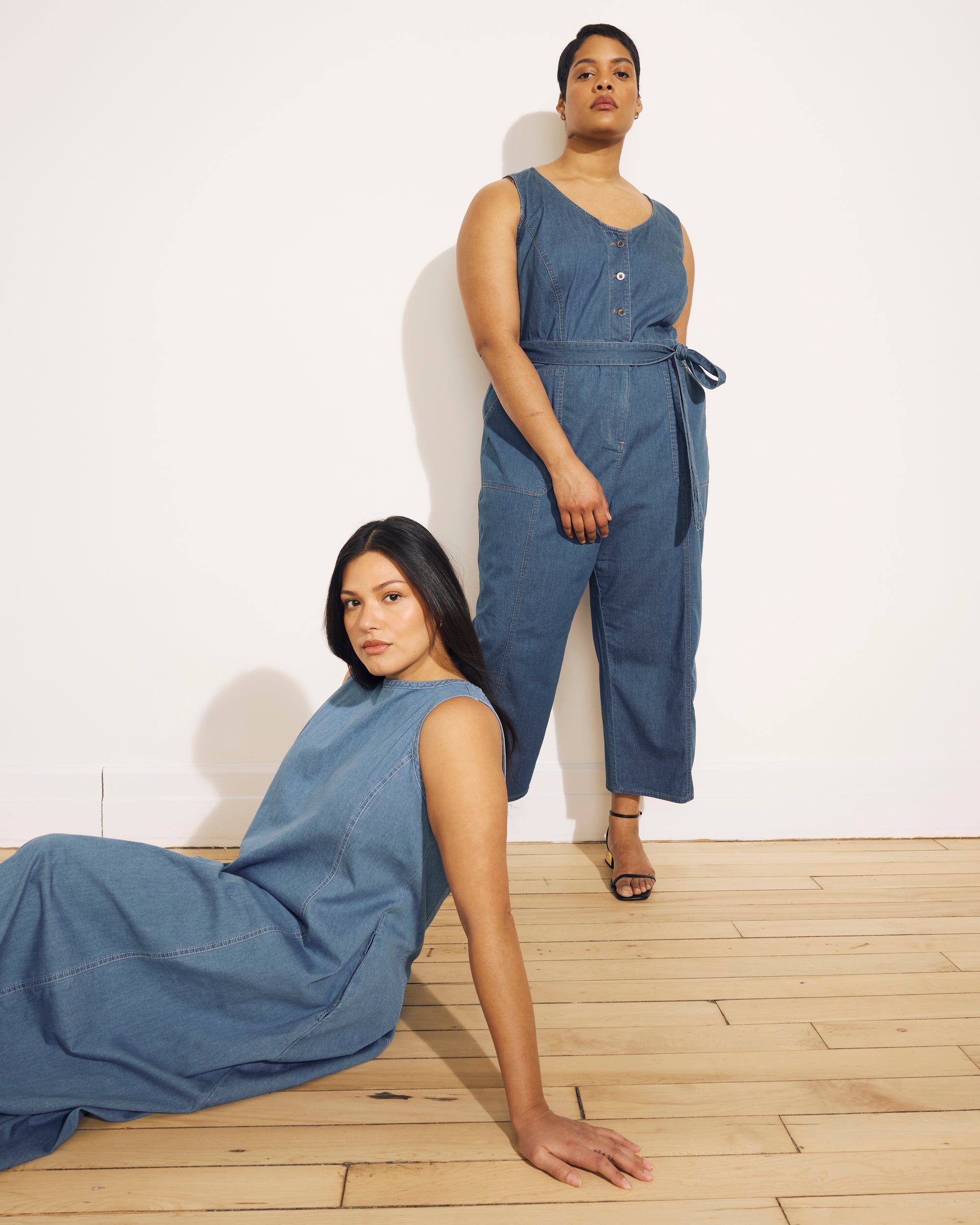 Woman wearing Kendra Cotton Chambray Tank Dress - Cove Blue from Universal Standard