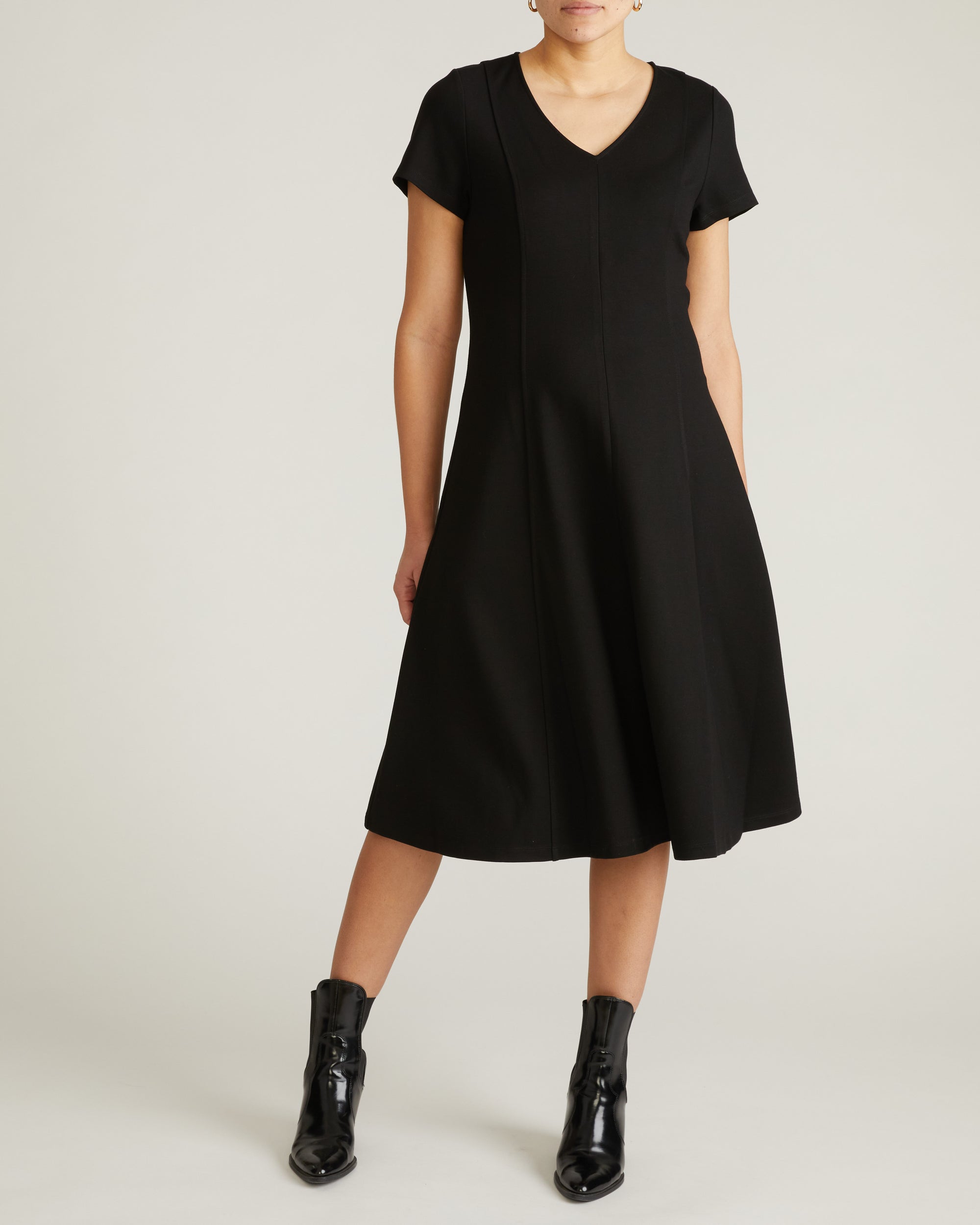 Woman wearing Lucinda Ponte Dress - Black from Universal Standard