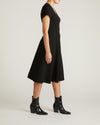 Woman wearing Lucinda Ponte Dress - Black from Universal Standard
