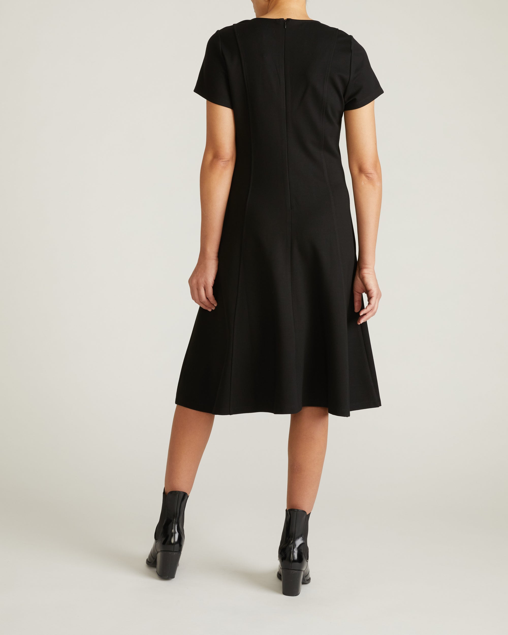 Woman wearing Lucinda Ponte Dress - Black from Universal Standard