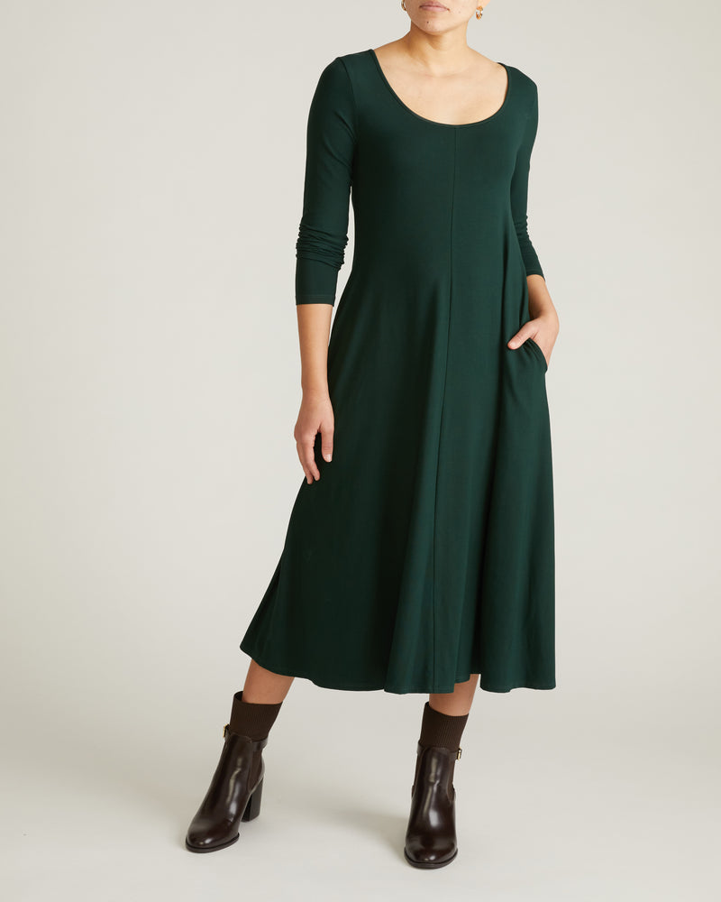 Woman wearing Cora Divine Jersey Dress - Forest Green from Universal Standard