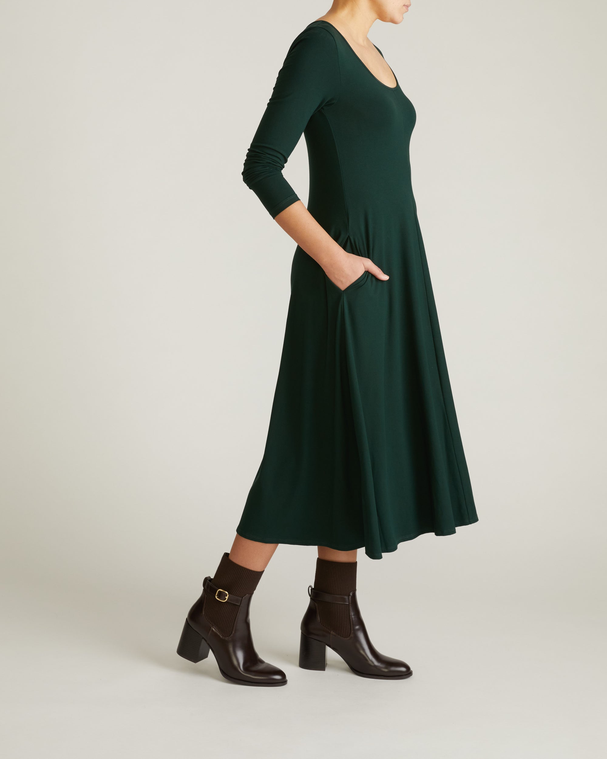 Woman wearing Cora Divine Jersey Dress - Forest Green from Universal Standard