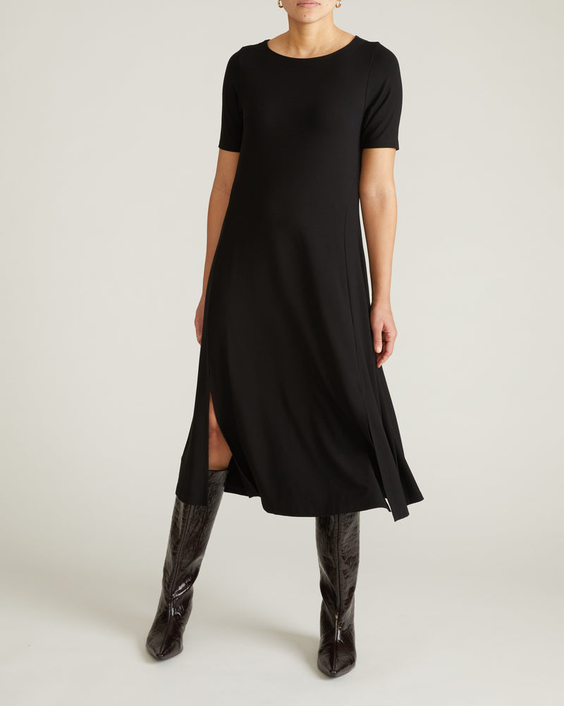 Woman wearing Serena Boat Neck Divine Jersey Dress - Black from Universal Standard
