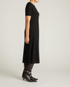 Woman wearing Serena Boat Neck Divine Jersey Dress - Black from Universal Standard