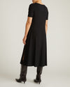 Woman wearing Serena Boat Neck Divine Jersey Dress - Black from Universal Standard