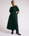 Woman wearing Serena Boat Neck Divine Jersey Dress - Forest Green from Universal Standard