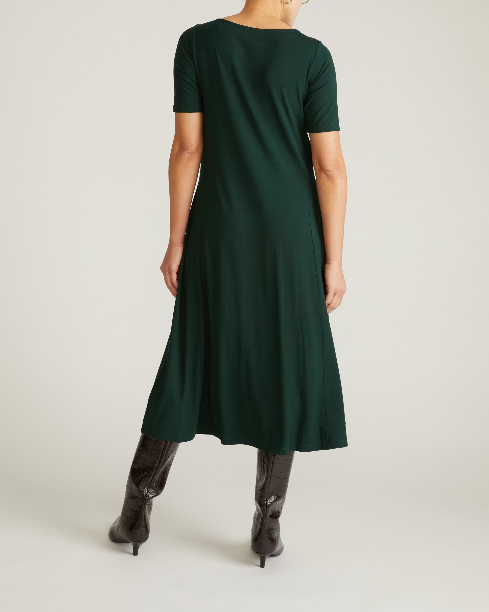 Woman wearing Serena Boat Neck Divine Jersey Dress - Forest Green from Universal Standard