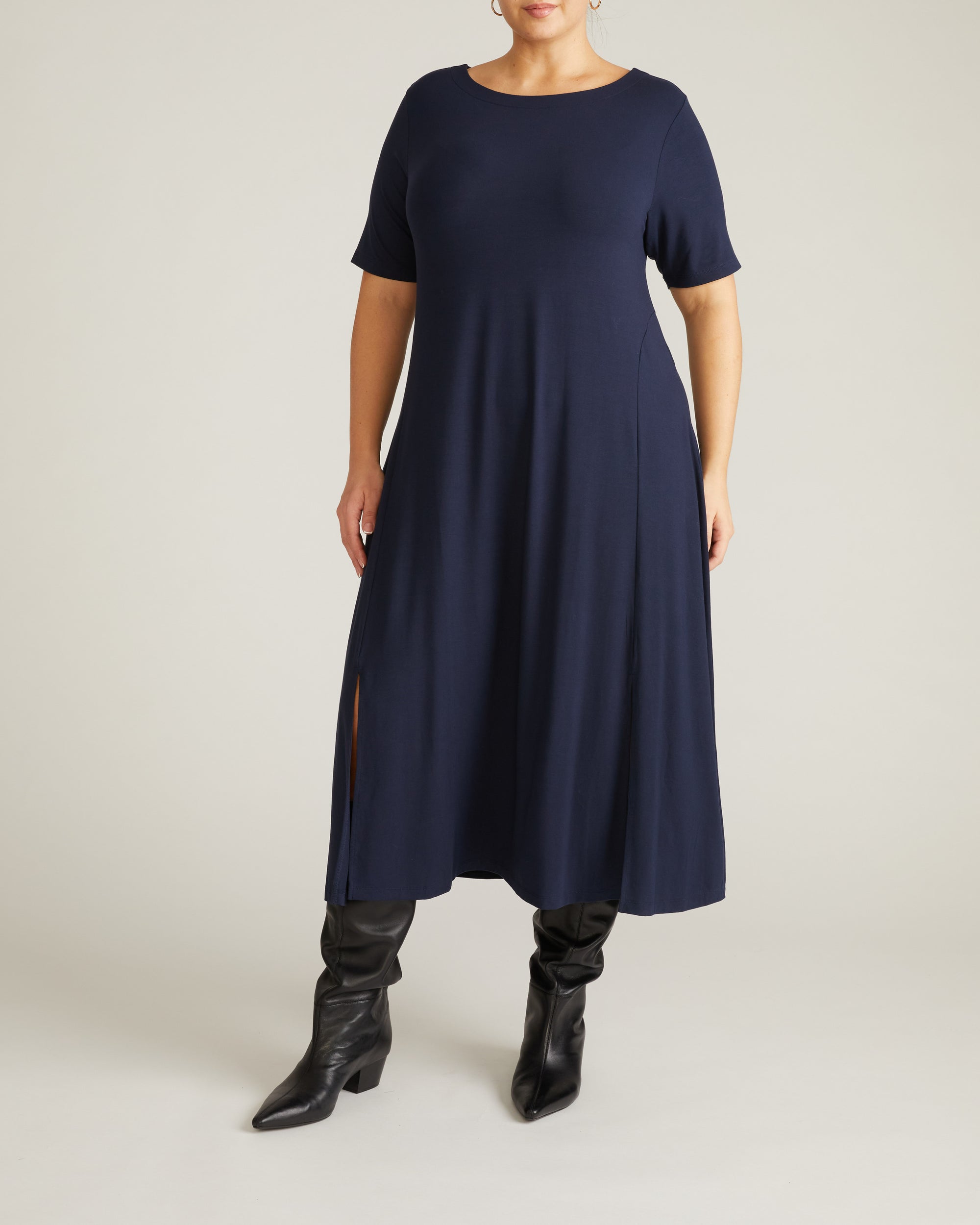 Woman wearing Serena Boatneck Divine Jersey Dress - Midnight from Universal Standard