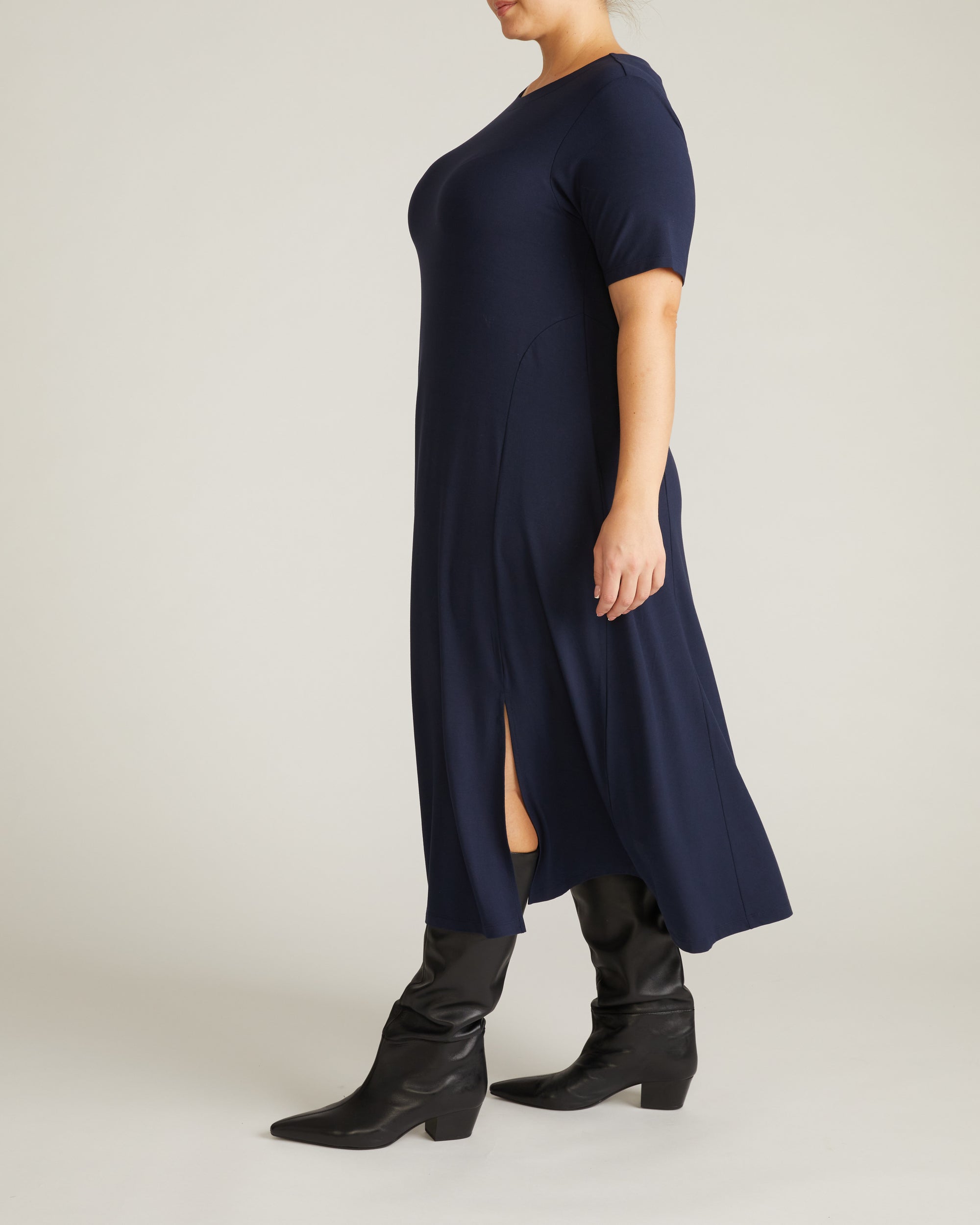 Woman wearing Serena Boatneck Divine Jersey Dress - Midnight from Universal Standard