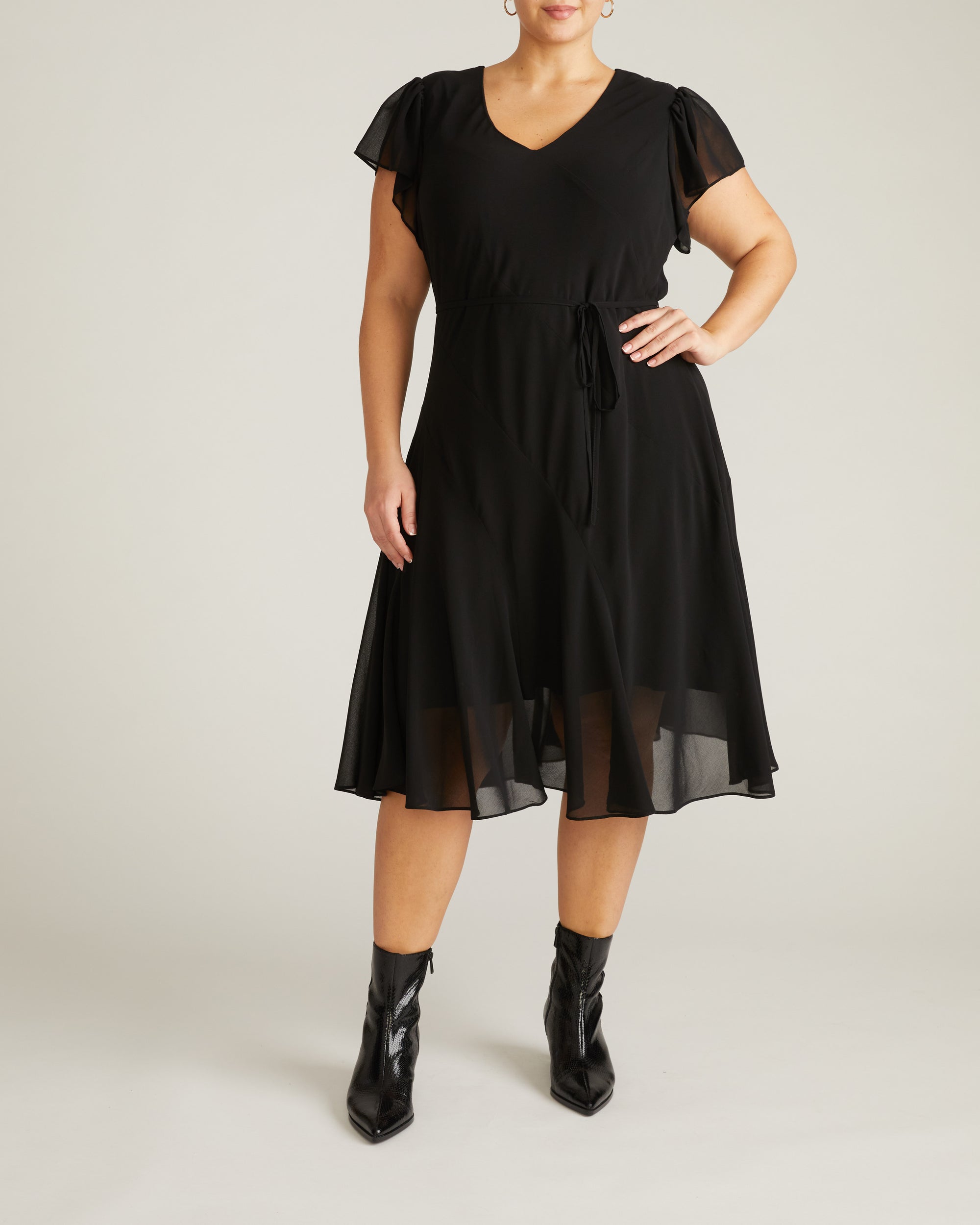 Woman wearing Seville Chiffon Dress - Black from Universal Standard