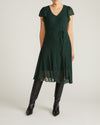 Woman wearing Seville Chiffon Dress - Forest Green from Universal Standard