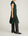Woman wearing Seville Chiffon Dress - Forest Green from Universal Standard