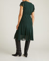 Woman wearing Seville Chiffon Dress - Forest Green from Universal Standard