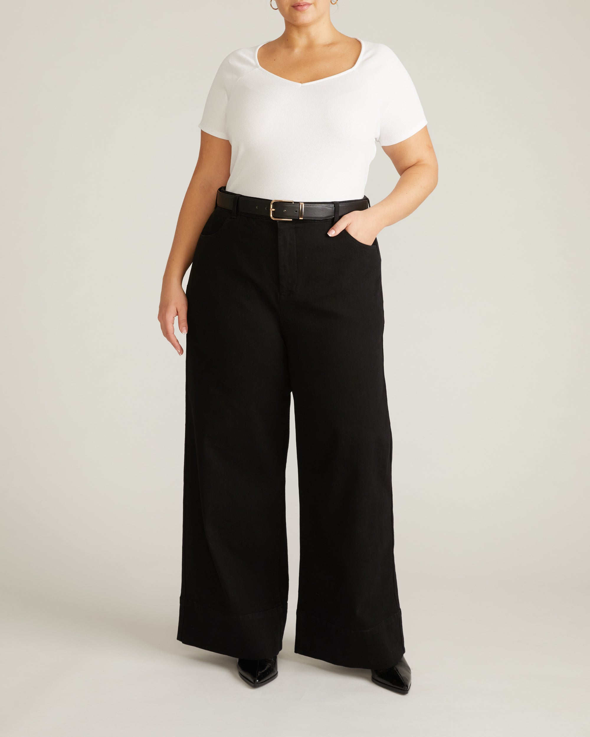 Woman wearing Carrie High Rise Wide Leg Jeans - Jet Black from Universal Standard